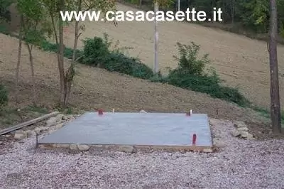 platea in calcestruzzo per casetta in legno